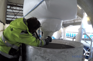 Rebulking of material from big bag to silo in HaminaKotka port - Hacklin Bulk Boys